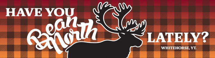 Plaid pattern with a caribou silhouette and text &