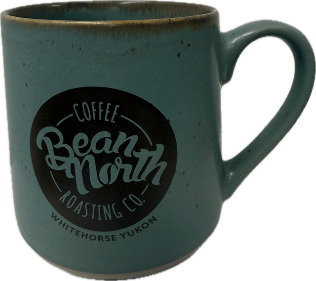 Teal mug with 'Coffee Bean North Roasting Co.' logo on a white background